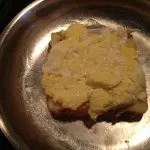 Removed from the pan and then brushed pan with a little more butter (I used smart balance) and began toasting the bread then added the egg