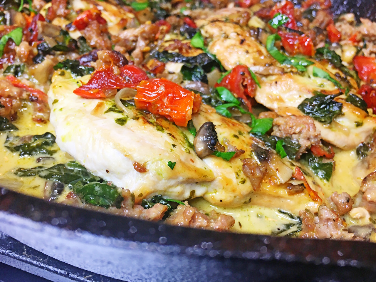Skillet Chicken with Sausage, Sun Dried Tomatoes, Mushrooms and Spinach